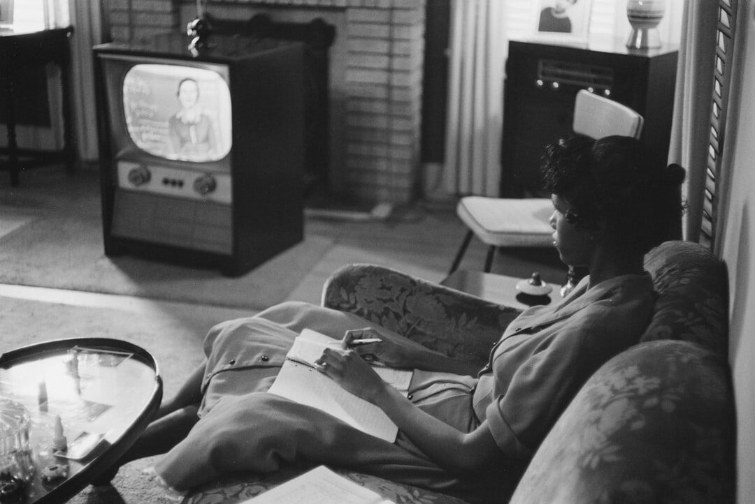 1950s family watching television commercial