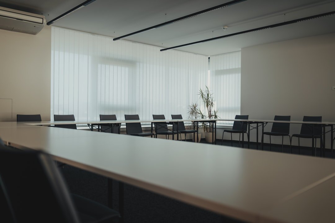 Bright meeting room with rows of chairs